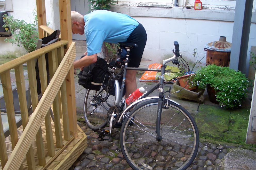Peter loading his bicycle
