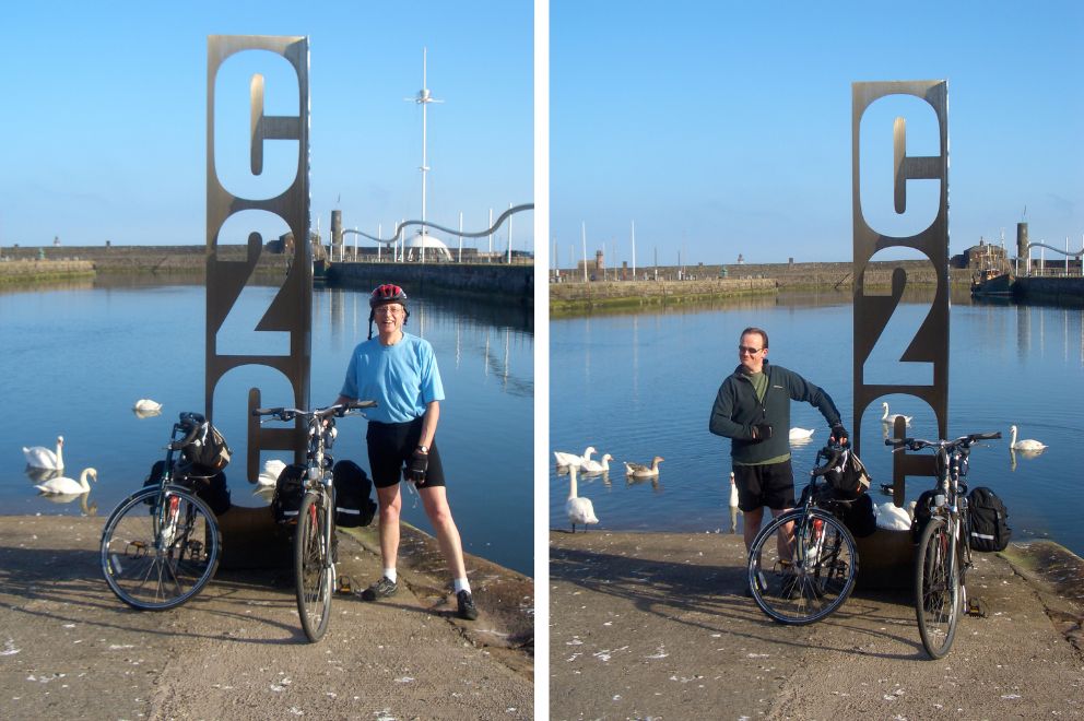 Two photos of each of us at C2C sign by harbour.