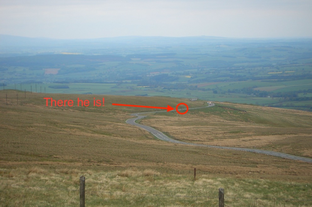 sweeping view across dale with winding road
