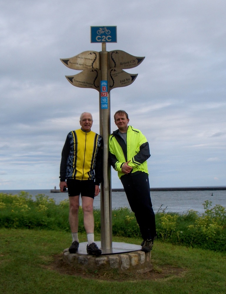 Both of use by metal sign marking end of ride.