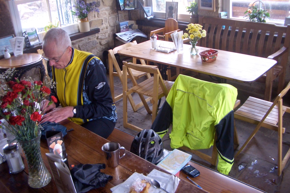 Peter n tearoom at table with food.